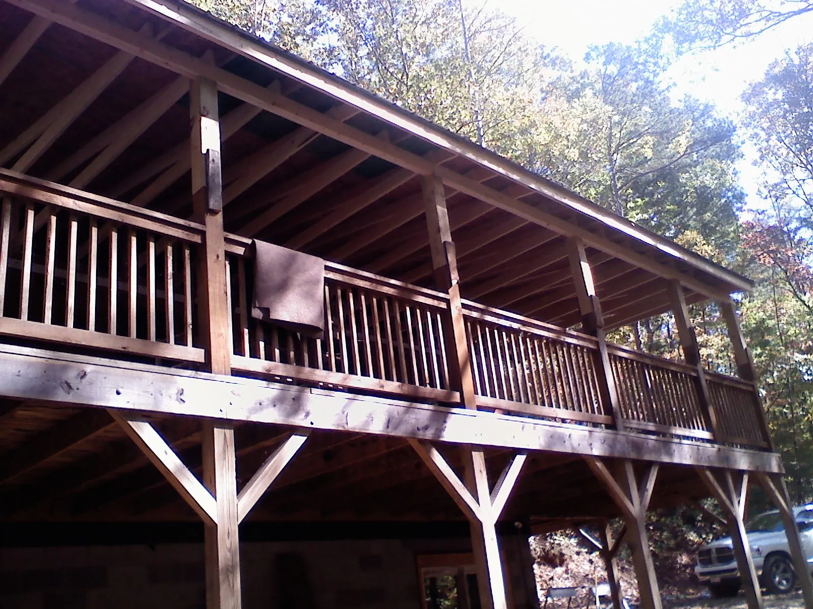Timber framing under a new elevated porch and deck — Roof Leak Repair in South Ozone Park by Roofing Brothers